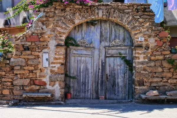 ancient,architecture,brick,brick wall,building,daylight,door,entrance,exterior,facade,gate,historic,house,italy,outdoors,plants,sardinia,stone,traditional,travel,wall,wood,wooden,Free Stock Photo