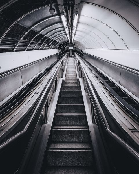 holding,hand,summer,lamp,industrial,architecture,white,black,black and white,staircase,stairway,urban,stair,underground,escalator,perspective,structure,architecture,looking up,grey,gray