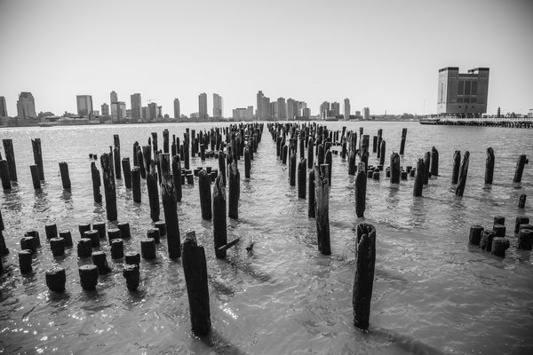 dock,warf,water,posts,marina,skyline,water posts,wooden posts, marina in city