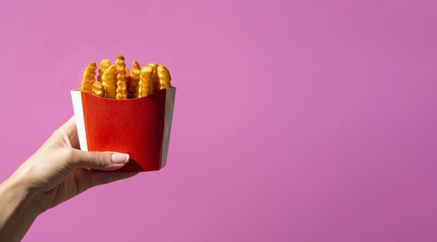 copy space,calories,tasty,colored,copy,horizontal,fries,french,french fries,colourful,fast,fast food,energy,white,colorful,space,red,pink,box,hand,food,background
