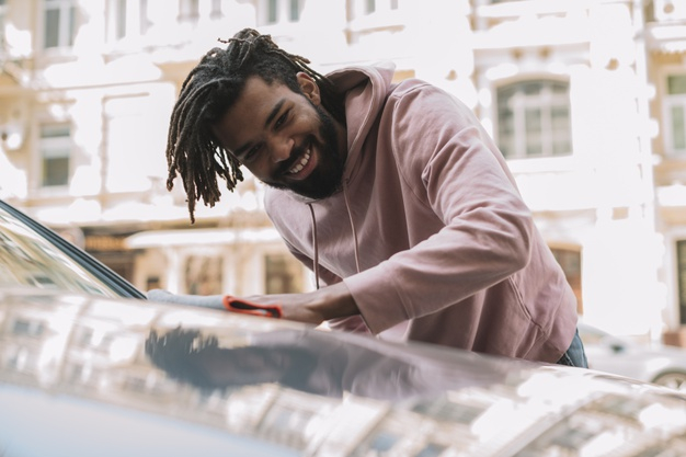 medium shot,front view,afroamerican,medium,attractive,handsome,front,horizontal,shot,male,portrait,view,model,transport,modern,cleaning,happy,man,car