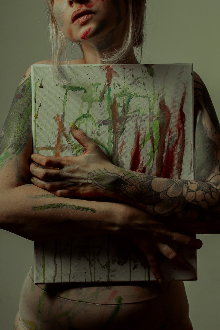 abstract painting,arms,canvas,colors,colours,hands,holding,messy,person,tattoo,tattooed