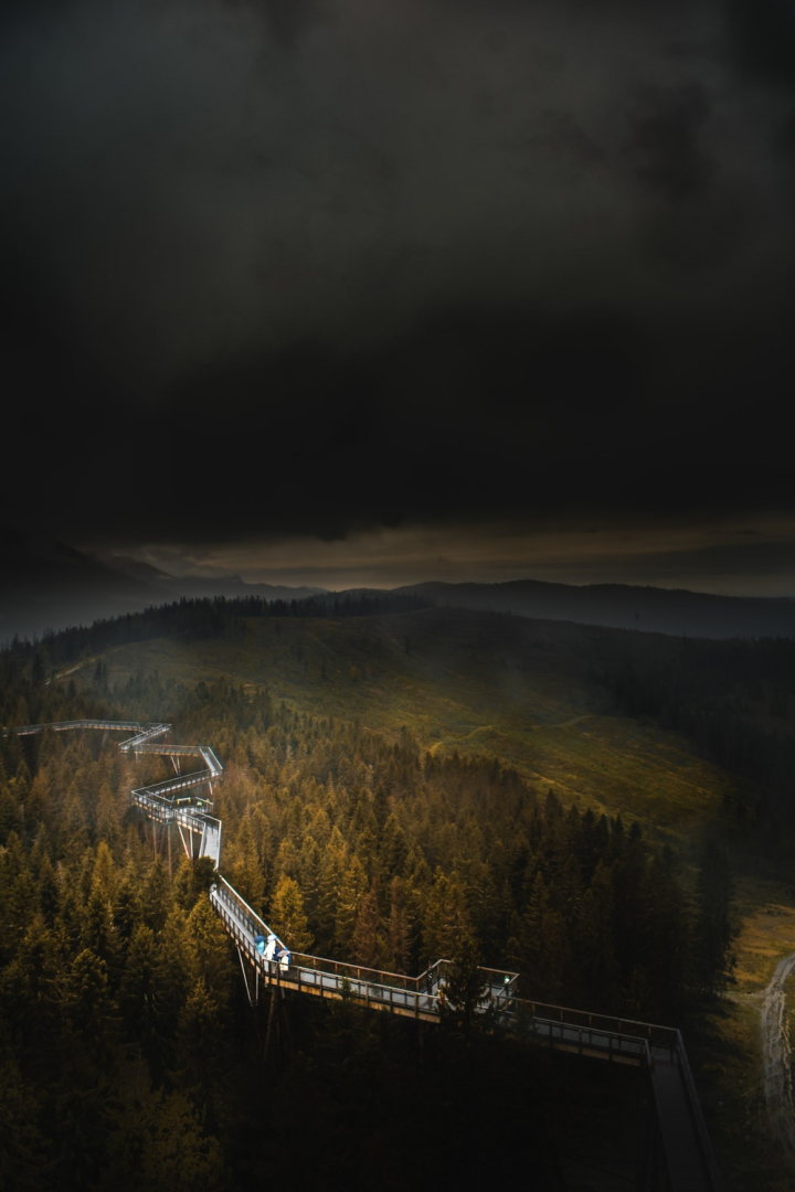 clouds,cloudy,dark,dark sky,environment,foggy,foot bridge,forest,green,landscape,mountain,nature,nature photography,scenic,sky,sunset,trees,weather,woods