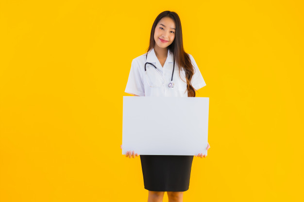 Cute Nurse Showing a Blank Clipboard Stock Image - Image of