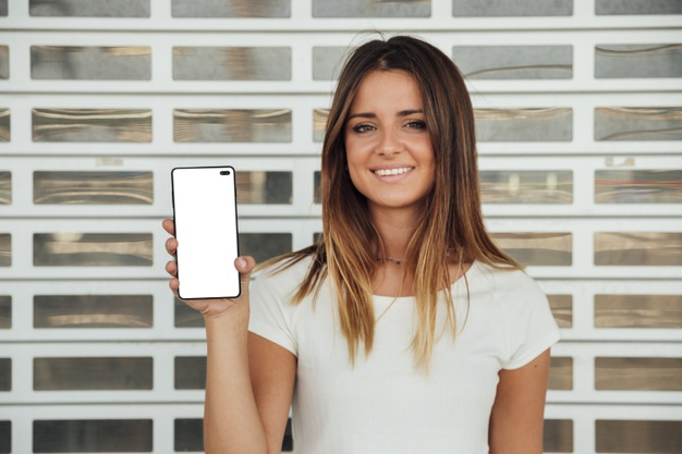 smiley girl,closeup,showing,mock,empty,horizontal,holding,blank,cell,up,device,cellphone,screen,mobile phone,smiley,modern,smartphone,telephone,digital,mobile,hands,girl,phone,technology,mockup