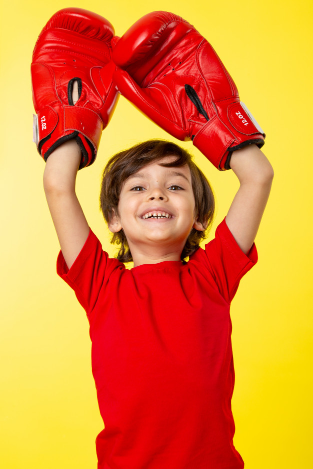 smiling cute kid,cheerful,front,smiling,pretty,joy,gloves,happiness,boxing,fun,tshirt,kid,happy,cute