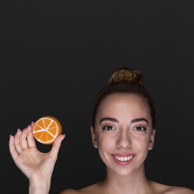 treatment,adult,therapy,skincare,portrait,beautiful,wellness,skin care,young,female,healthcare,care,skin,clean,healthy,product,cosmetic,body,happy,orange,face,cute,health,beauty,girl,woman