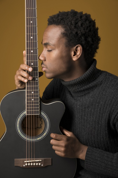 Free: Black boy playing the guitar Free Photo - nohat.cc