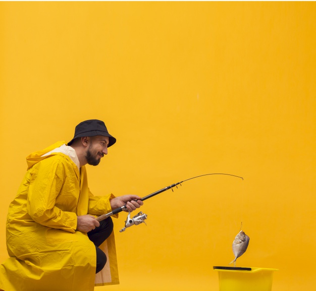 Man in Hat Fishing with Rod · Free Stock Photo