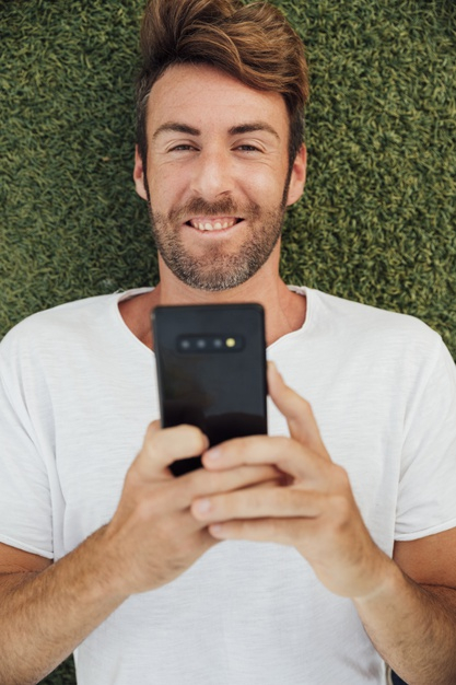 bearded man,mobilephone,bearded,touchscreen,holding,notification,top,sms,gadget,entertainment,view,cellphone,screen,message,connection,media,mobile phone,smiley,smartphone,social,internet,digital,network,mobile,man,social media,phone,technology