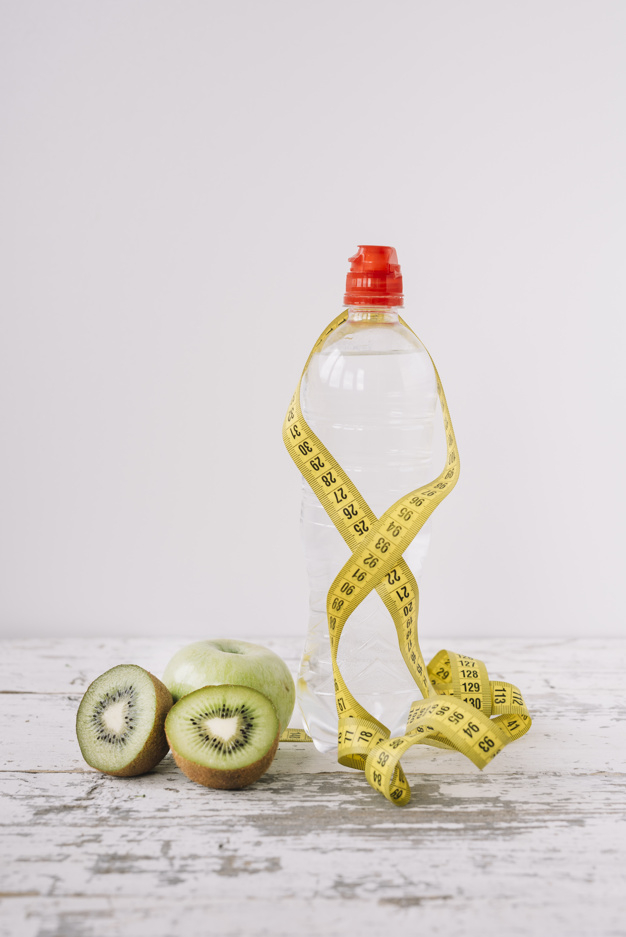 A Tape Measure and a Water Bottle Stock Photo - Image of lifestyle