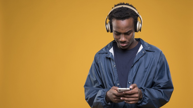 Free: Black man posing with headphones Free Photo - nohat.cc