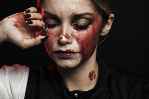 annually,front view,closeup,wearing,bloody,fake,front,annual,horizontal,portrait,view,female,blood,fall,makeup,black,celebration,autumn,woman,hand,halloween,background