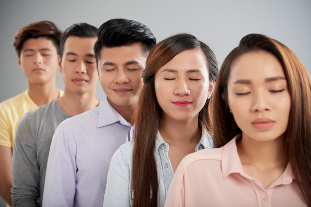 colleague,posing,closed eyes,vietnamese,row,standing,adult,closed,korean,asian,young,together,group,men,eyes,japanese,women,face,chinese,people