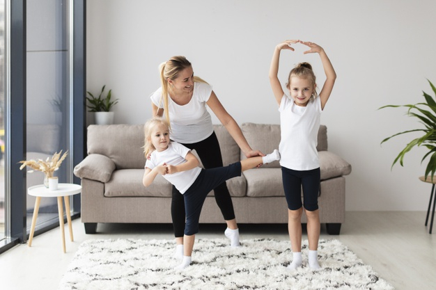 Free Daughters And Mother Exercising At Home Free Photo Nohat Cc