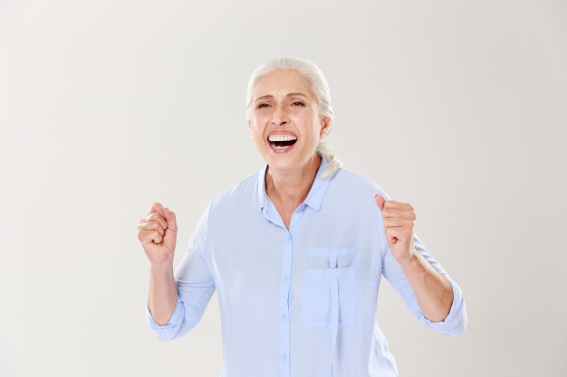 overjoyed,grayhaired,toothy,maturity,caucasian,closeup,pensioner,charming,fists,mature,wrinkle,joyful,aged,retired,attractive,granny,older,elder,looking,retirement,senior,portrait,beautiful,grandmother,fan,female,lady,old,celebrate,healthy,winner,elegant,happy,hands,woman