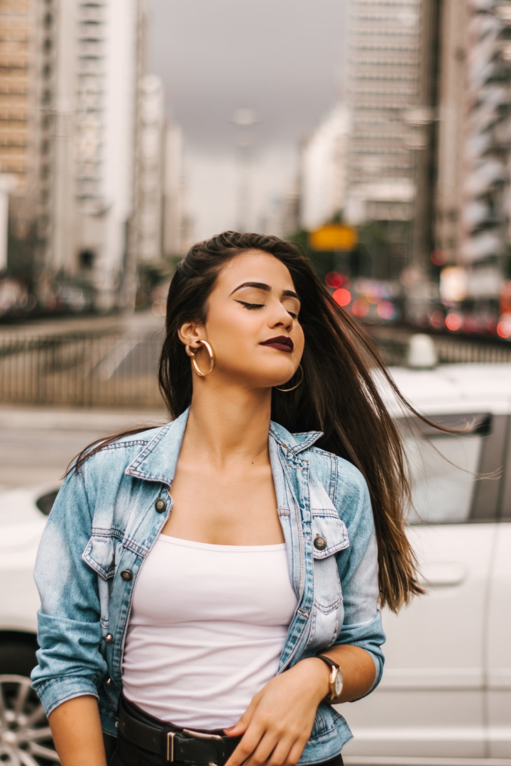 Interested Glamorous Woman In Oversized Denim Jacket Makes Selfi Gorgeous  Brunette Girl Posing On City Background Stock Photo - Download Image Now -  iStock