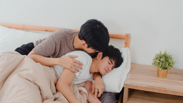 Free: Asian gay couple kiss and hug on bed at home. young asian lgbtq+ men  happy relax rest together spend romantic time after wake up in bedroom at  home in the morning .