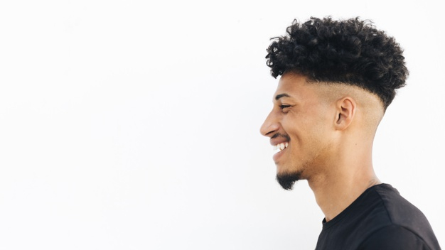 copy space,half face,glad,side view,bearded,black hair,joyful,contrast,half,cheerful,side,african american,copy,smiling,stylish,horizontal,curly hair,curly,laugh,male,american,positive,teen,portrait,view,hairstyle,young,african,studio,teenager,profile,person,white,happy,white background,smile,black,face,space,student,hair,man,background