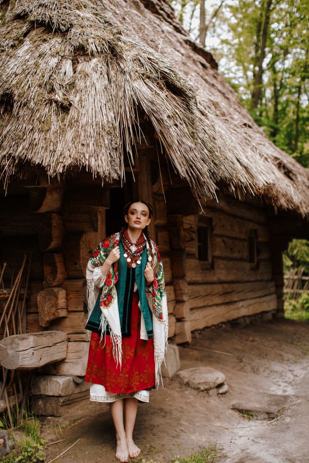 courtyards,slavic,near,poses,ukrainian,shawl,national,folklore,popular,gorgeous,russian,adult,folk,alone,costume,embroidery,portrait,beautiful,young,female,outdoor,traditional,culture,model,village,dress,park,person,elegant,clothes,shirt,cute,girl,fashion,woman,ornament,house