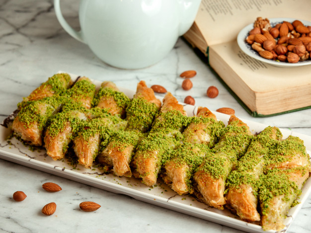 Free Side View Of Turkish Sweets Baklava With Pistachio On Platter
