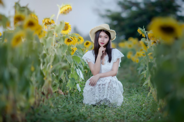 Chinese Girl Wearing a White Dress Stock Image - Image of field