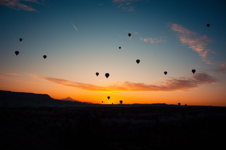 air,aircrafts,atmosphere,cappadocia,dawn,dusk,environment,flying,golden hour,hot air balloons,hot-air balloons,nevsehir,scenery,scenic,silhouette,sky,sunrise,sunset,turkey,valley