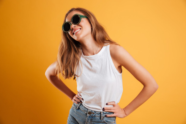 Glad Lady in Casual Jeans Outfit Standing in Confident Pose during