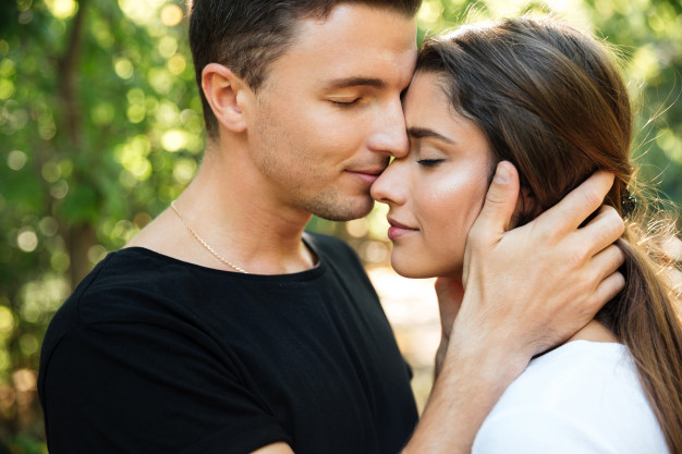 Free: Close up portrait of a happy beautiful couple in love Free Photo 