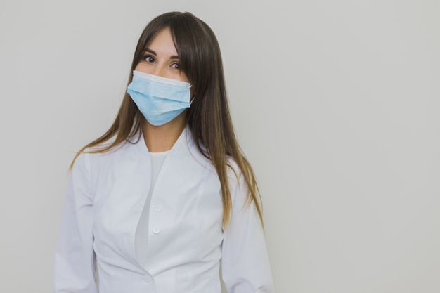 practitioner,orthodontist,front view,copy space,surgical mask,oral hygiene,stomatology,posing,surgical,oral,pose,front,copy,technician,horizontal,dentistry,hygiene,medic,view,female,dentist,mask,dental,medicine,space,health,woman