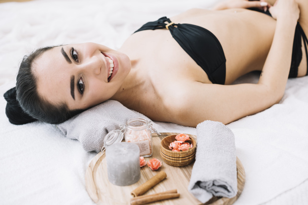 masseuse,therapeutic,receiving,relaxed,relaxing,relaxation,treatment,calm,hygiene,stones,therapy,towel,zen,wellness,care,relax,salon,stone,healthy,natural,massage,body,beauty salon,health,spa,beauty,nature,woman