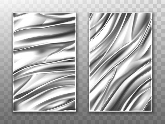 Close-up Shot of Cut Metal Shiny Silver Sheets Forming an Abstract