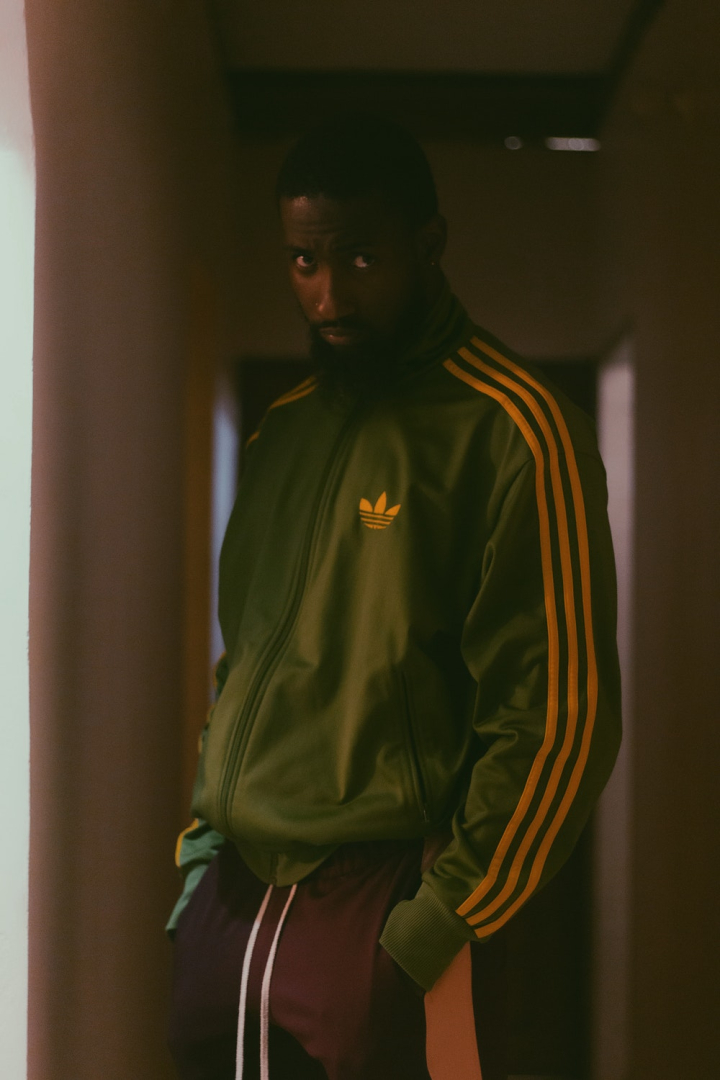 adidas,adult,casual,facial hair,fashion,fashionable,fine-looking,guy,indoors,light,male,man,model,outerwear,outfit,person,photoshoot,portrait,pose,sports wear,style,sweater,wear