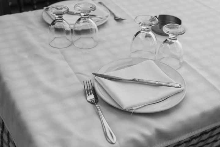 black-and-white,cutlery,flatware,fork,grayscale,knife,monochrome,plate,silverware,simple,simplicity,table,table napkin,table setting,tablecloth,tableware,wine glass
