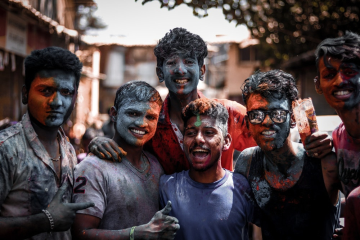 Free: Group of men with faces and body covered with coloured