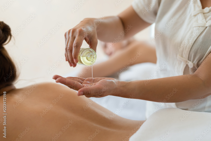 Premium Photo  Back massage for the girl in the salon