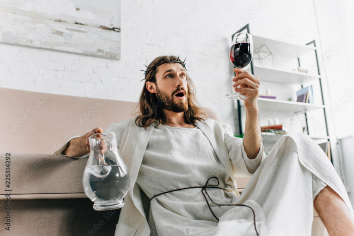 person,people,water,caucasian,male,man,drink,wine,home,beverage,room,surprised,indoor,alcohol,alone,apartment,photogenic,sofa,jug,shocked,couch,jesus christ,alcoholic,bearded,long hair,young adult,living room,wine glass,adobestock