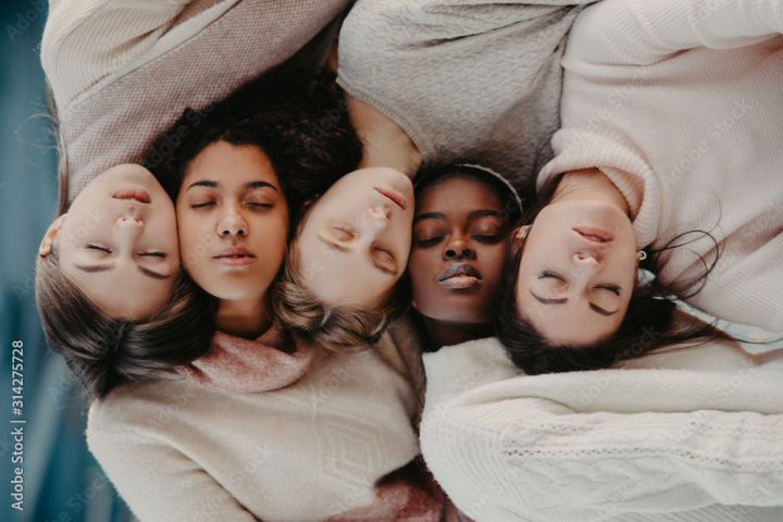 woman,girl,young,multiracial,group,together,mixed,race,friends,portrait,cooperation,oneness,friendship,caucasian,black,asian,african,afro,american,white,ethnic,ethnicity,lifestyle,stylish,casual attire,happy,beautiful,pretty,positive,attractive,serious,fashion,adult,female,people,person,5,day,outdoors,concept,face,lying,top,view,closed,eye,different,skin,colours,adobestock