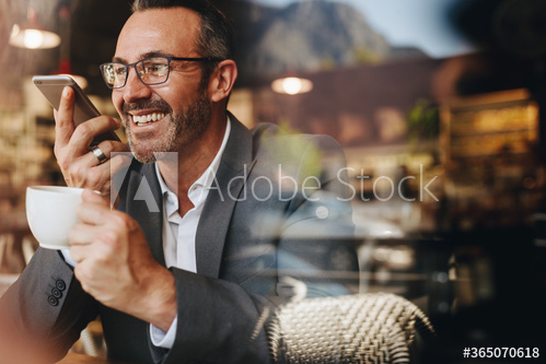 man,phone,entrepreneur,cafes,business,businessman,caucasian,hot drink,cafes,eyeglass,glasses,indoor,inside,lifestyle,looking,male,mature,man,mobile,modern,1,people,person,real,eatery,sitting,smiling,speaker,table,talking,using,work,working,adobestock