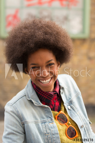 portrait,smile,woman,adult,young,afro,denim,jacket,racked,lifestyle,outdoors,day,people,1,alone,adobestock