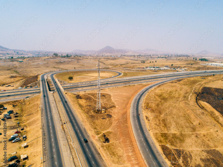 road,landscape,highway,aerial,nature,view,travel,sky,city,mountain,desert,transportation,sea,water,river,mountain,expressway,spain,countryside,road,asphalt,traffic,drone,way,car,truck,trip,hill,winding,drive,driving,summer,nobody,route,adobestock