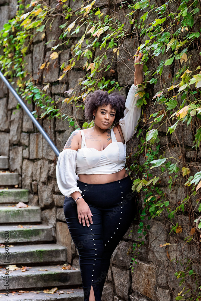 curvy,black woman,black,woman,outside,fall,winter,cold,leaf,stair,fashion,style,city,downtown,atlanta,georgia,natural,curly hair,lifestyle,nature,outdoors,model,park,people,person,hair,adobestock