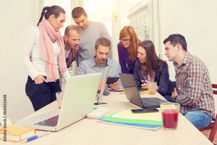 team,work,business,people,working,meeting,group,together,young,office,communication,planning,conference,tablet,typing,teamwork,successful,laptop,happy,female,table,white,male,woman,man,computer,talking,several,guy,discussing,room,7,adobestock