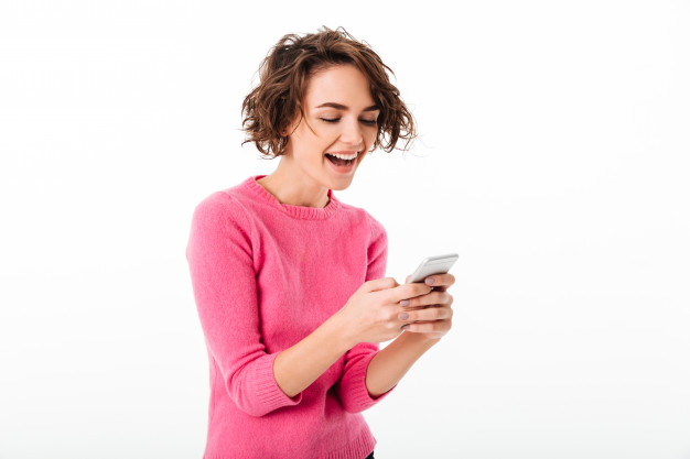 Free: Portrait of an excited pretty girl playing games Free Photo 