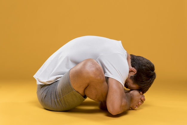 Free: Athletic man doing yoga pose Free Photo 