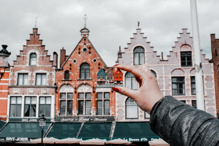 architectural design,architecture,belgio,belgium,brugge,building,city,cityscape,daylight,exterior,family,fiandre,fingernails,gand,hand,house,houses,magnetic,miniature,miniature toy,outdoors,same,street,toy,travel
