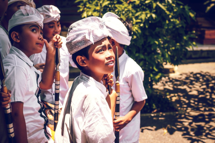 activity,asia,bali,balinese,beautiful,boys,celebration,ceremony,children,costume,cultural,culture,cute,daylight,face,facial expression,festival,group,happy,headdress,indonesia,indonesian,looking,outdoors,people,portrait,recreation,religion,religious,ritual,school,smile,spears,street,tradition,traditional,travel,turban,uniform,veil,wear,young