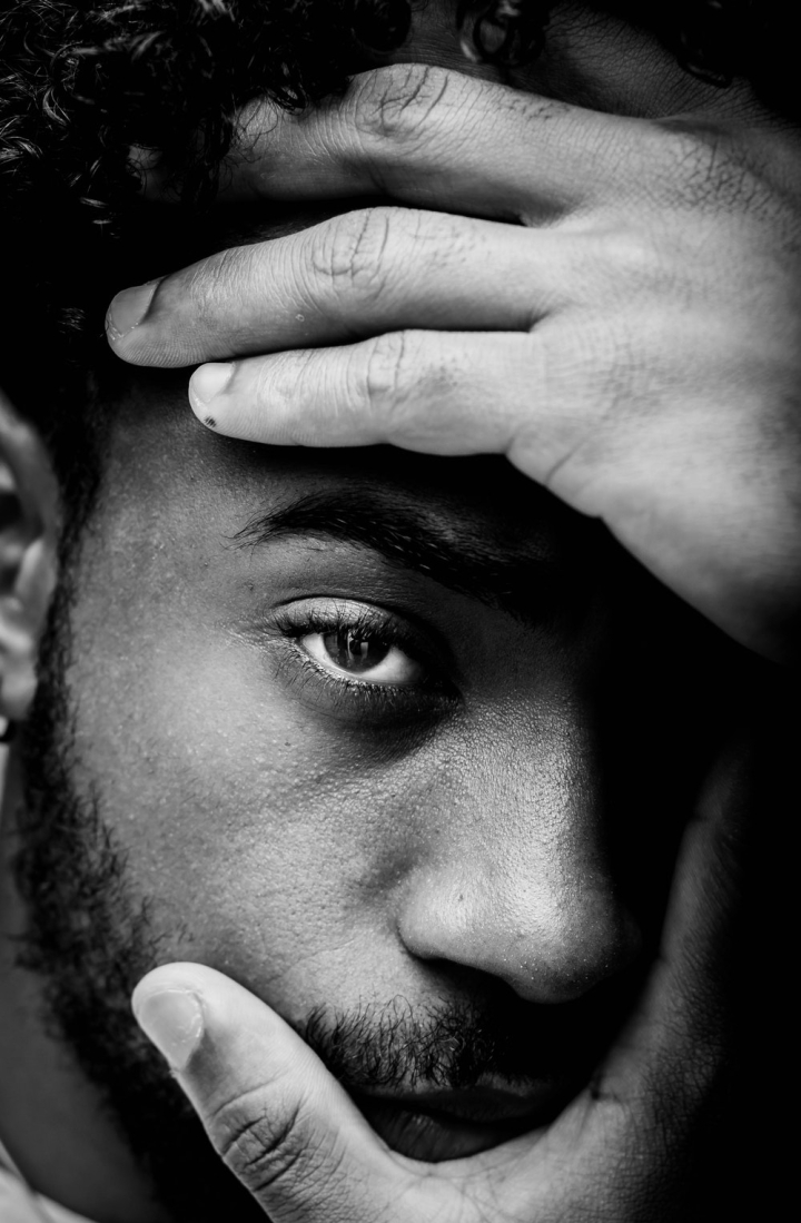 How long it lasts. Bored and indifferent displeased young african american  male student leaning face on palm looking at camera with boredom and apathy  feeling tired posing over gray background Stock Photo |