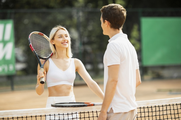 rackets,recreation,racket,outdoors,playing,active,horizontal,adult,match,court,player,fit,day,lifestyle,beautiful,net,young,female,youth,play,exercise,tennis,team,couple,game,sports,happy,girl,sport,man,woman,people