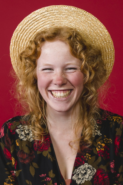 overjoyed,wicker hat,looking at camera,amused,toothy,studio shot,joyous,delighted,pleased,sincere,foxy,candid,adorable,glad,red hair,charming,redhead,satisfied,joyful,playful,straw hat,contemporary,wicker,leisure,looking,smiling,stylish,pretty,shot,laughing,curly,straw,positive,ginger,lovely,portrait,beautiful,content,young,female,studio,lady,hat,happy,red background,hair,red,camera,woman,background